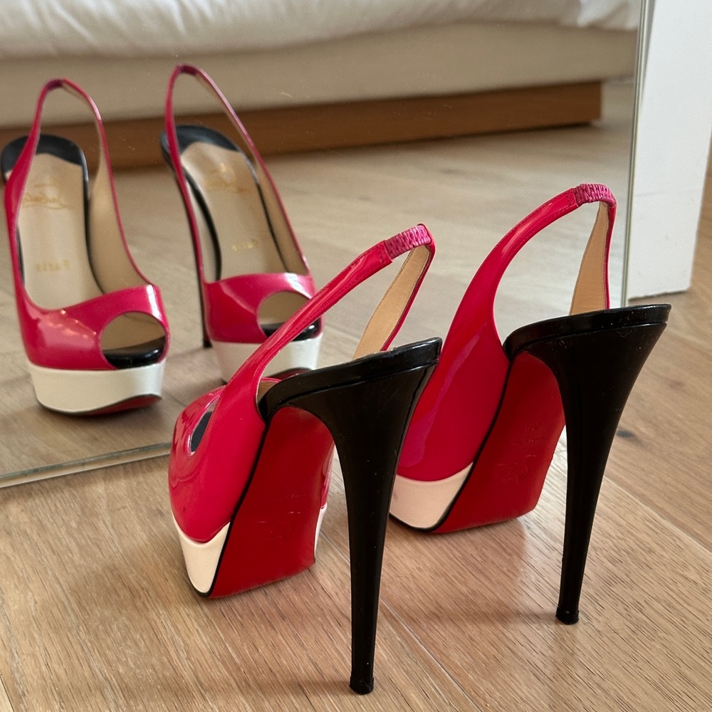 LOUBOUTIN hot pink sling back pumps